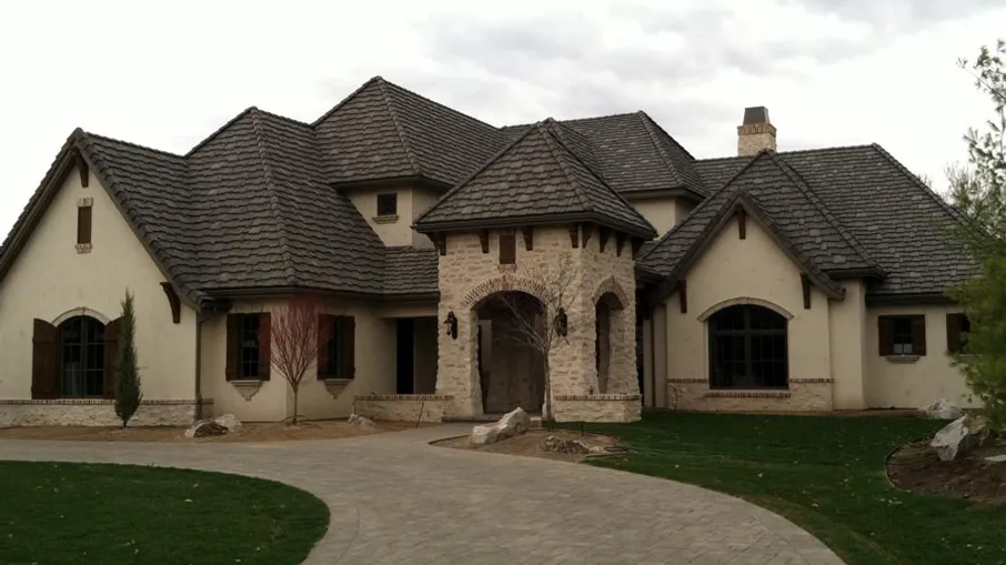 brown mansion with gutters